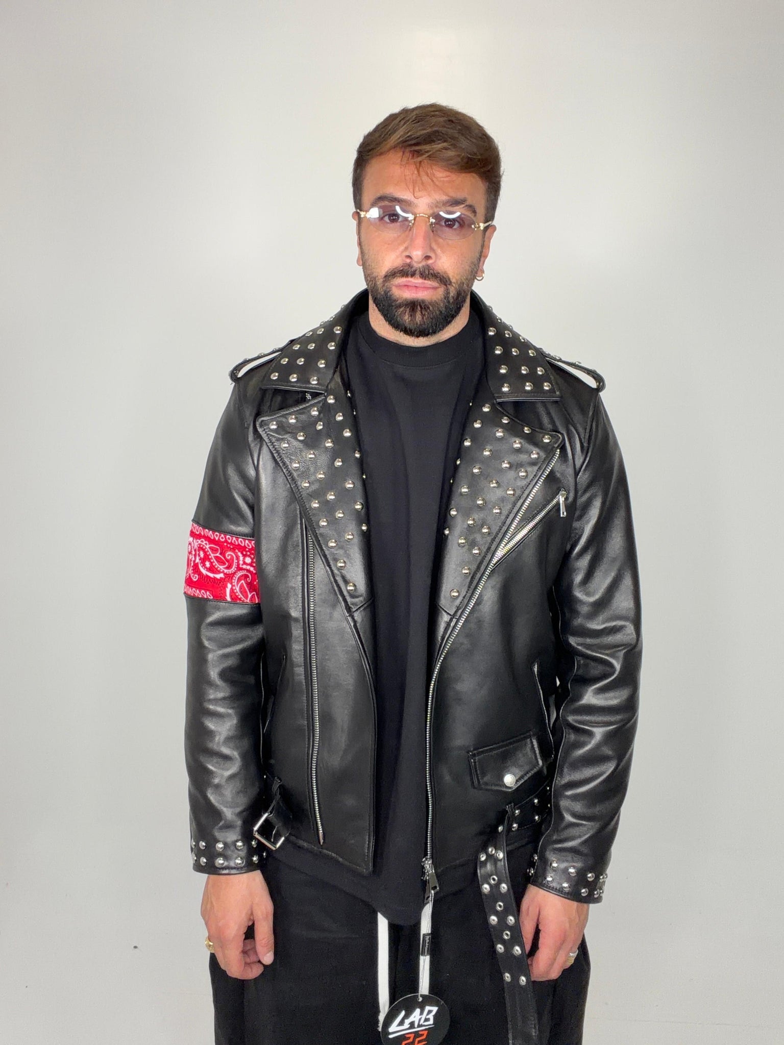 Chiodo in pelle borchiato