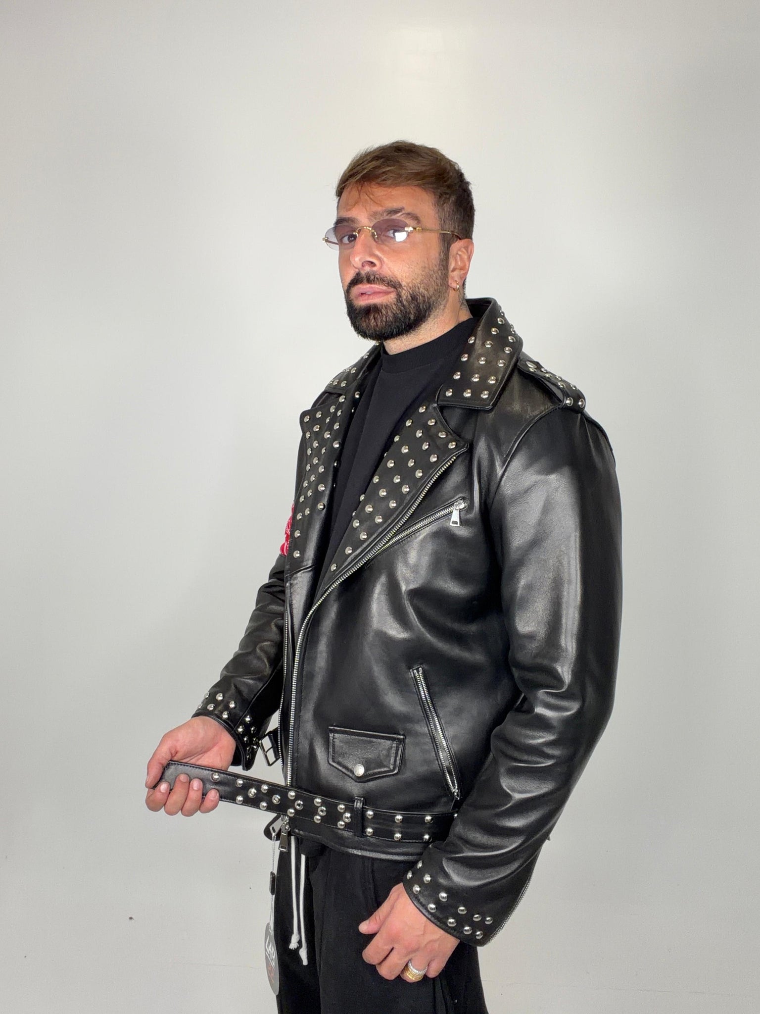 Chiodo in pelle borchiato