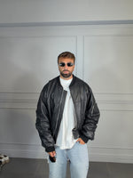 COLLEGE OVERSIZE CON MANICA ARRICCIO NERO MARTELLATO