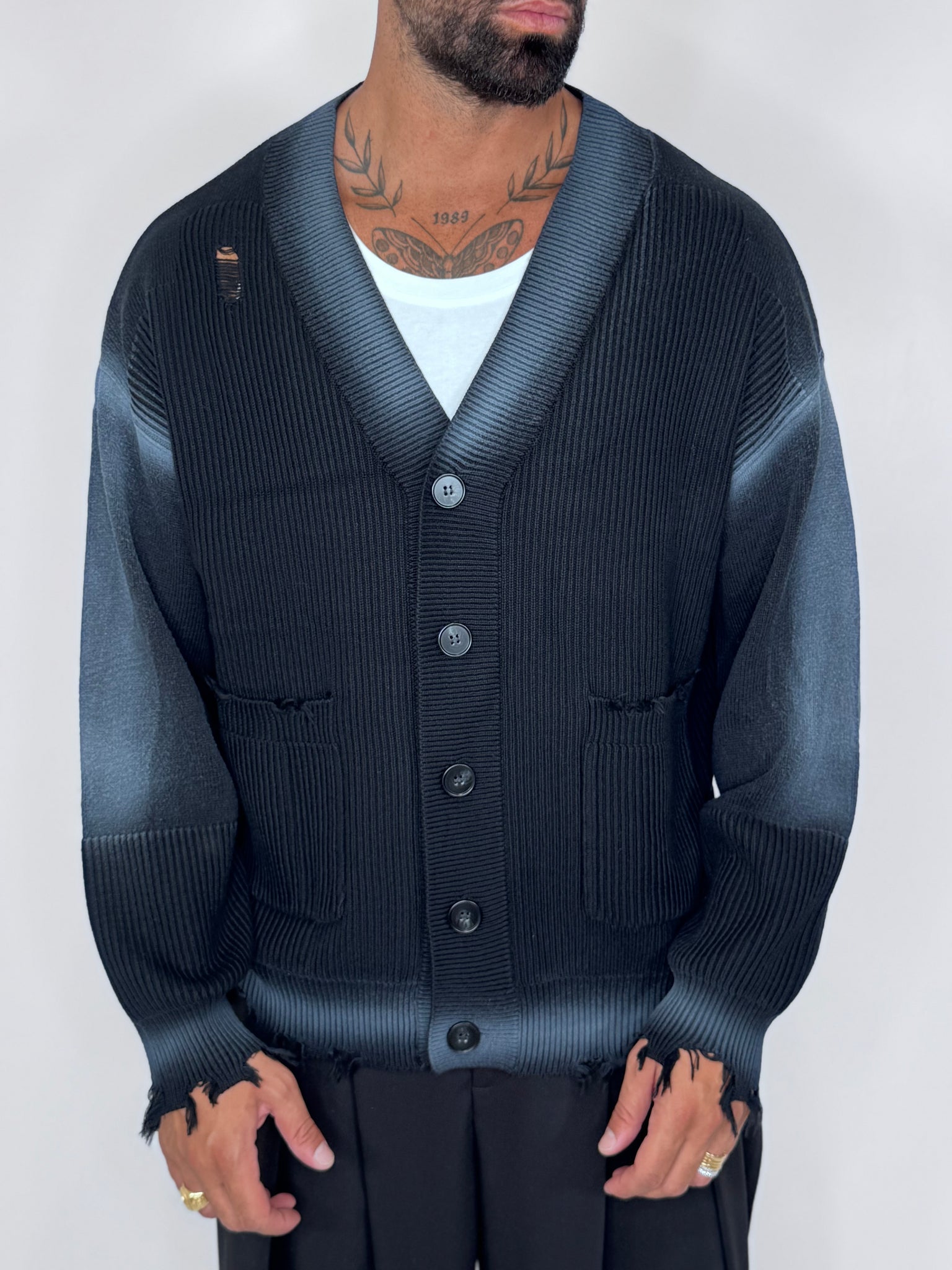 Cardigan con abrasioni