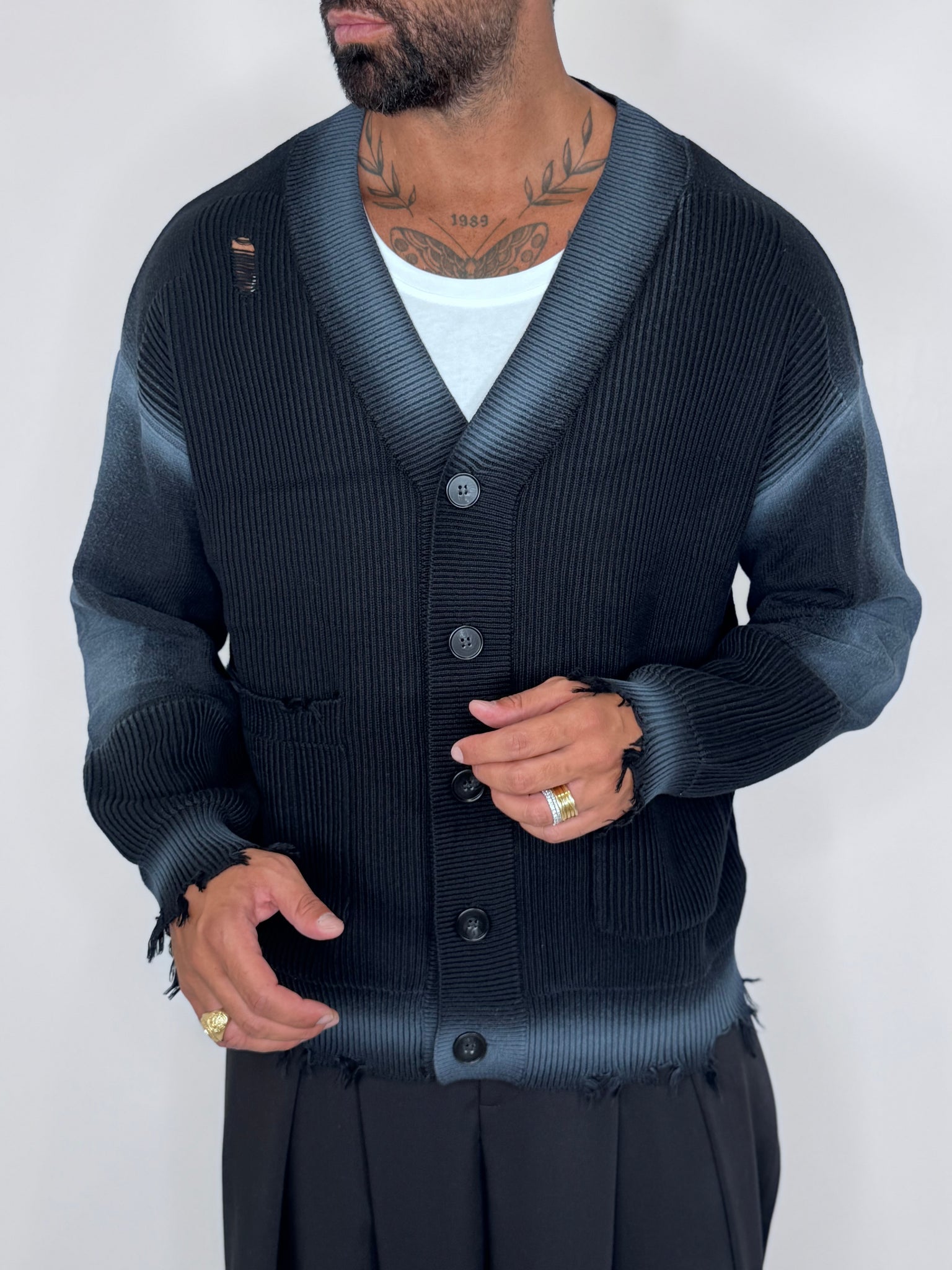 Cardigan con abrasioni