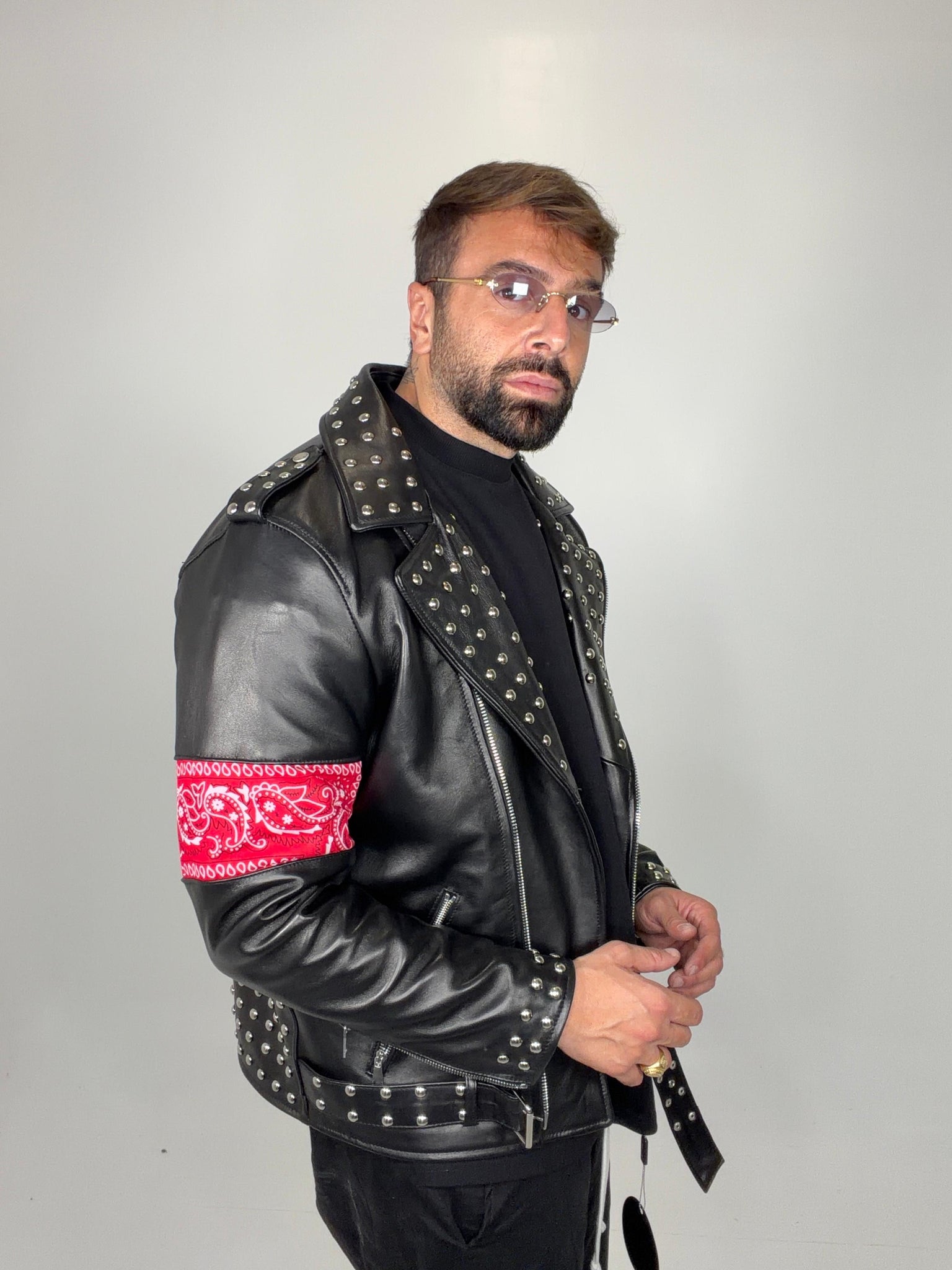 Chiodo in pelle borchiato