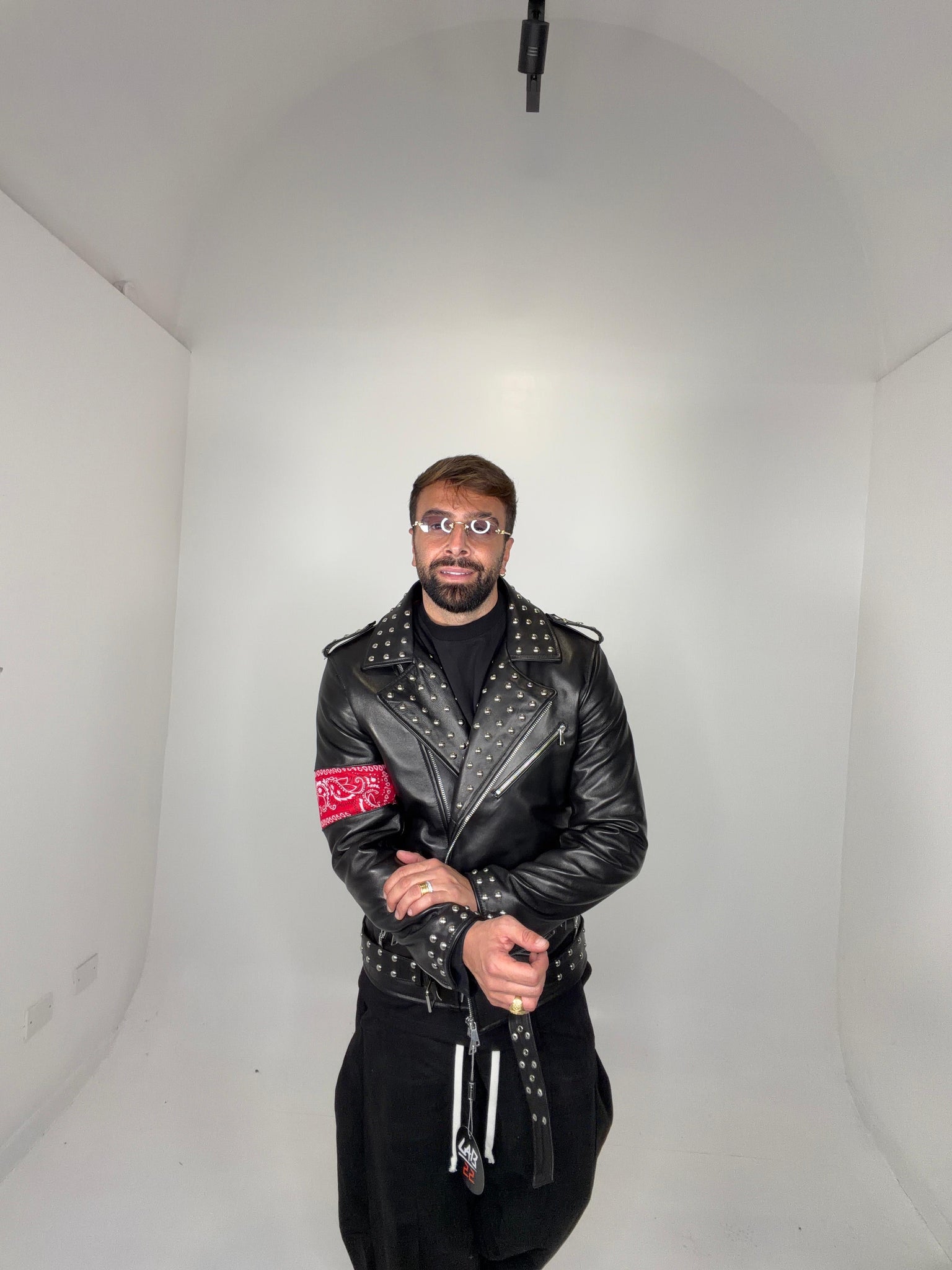 Chiodo in pelle borchiato